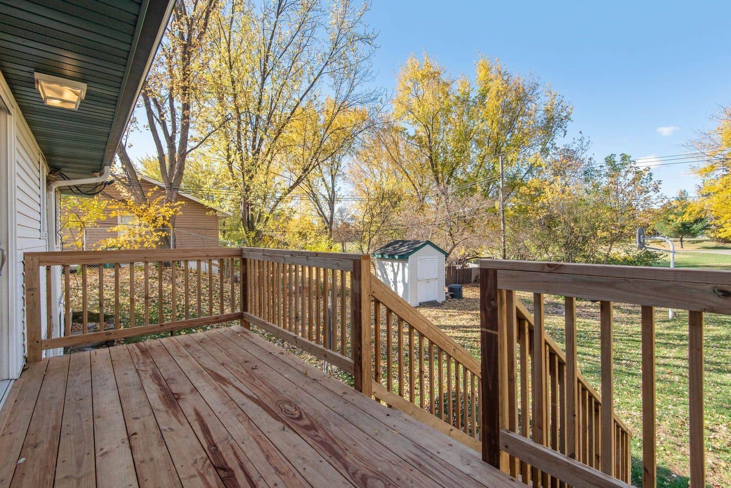 A finished wood deck built by Tony Fenton Carpentry in the Niagara Region
